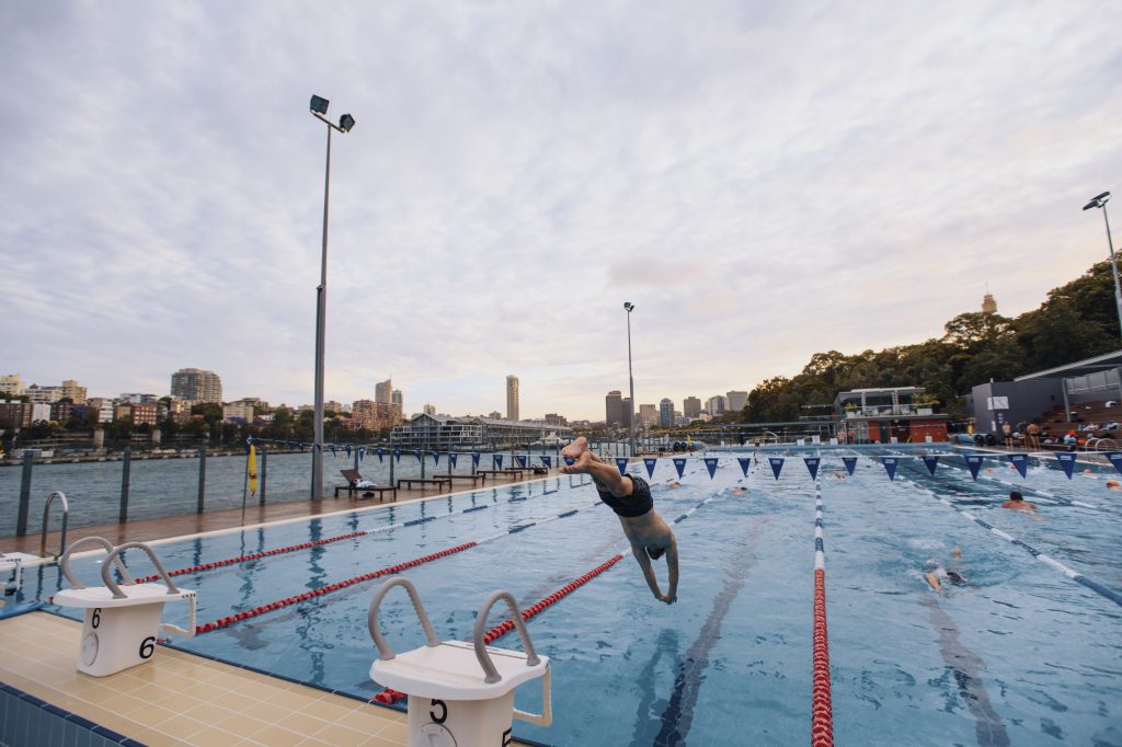 A man dives into Andrew Boy Charlton Pool