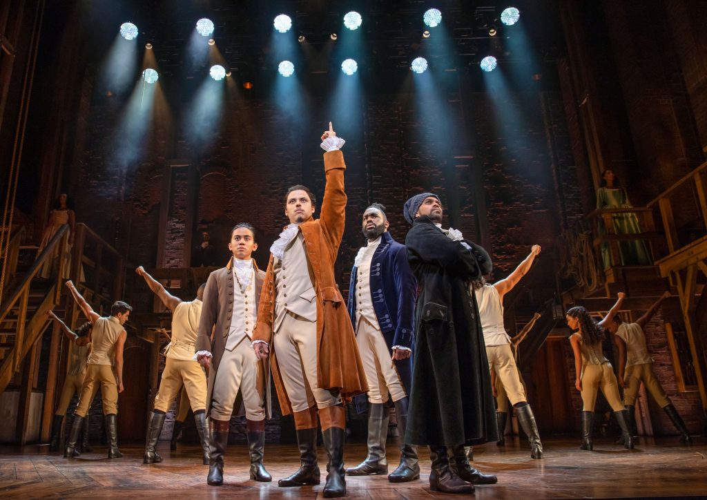 The Australian cast of Hamilton on stage