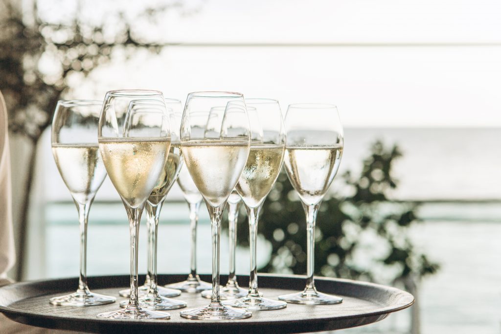 Glasses with champagne or white sparkling wine.