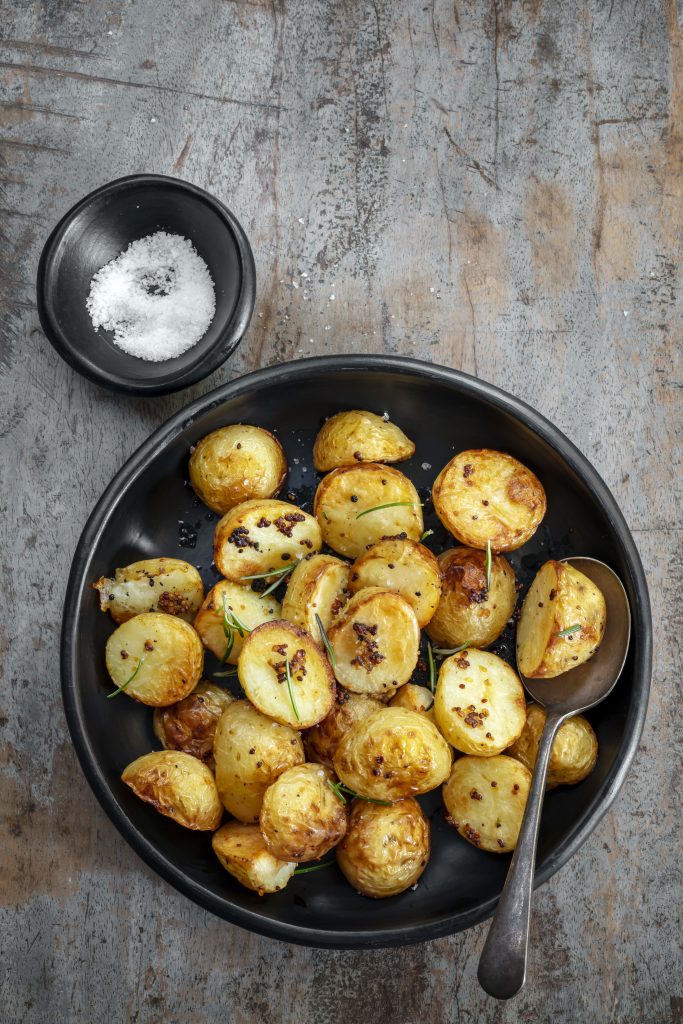 Roasted baby potatoes with mustard and rosemary.