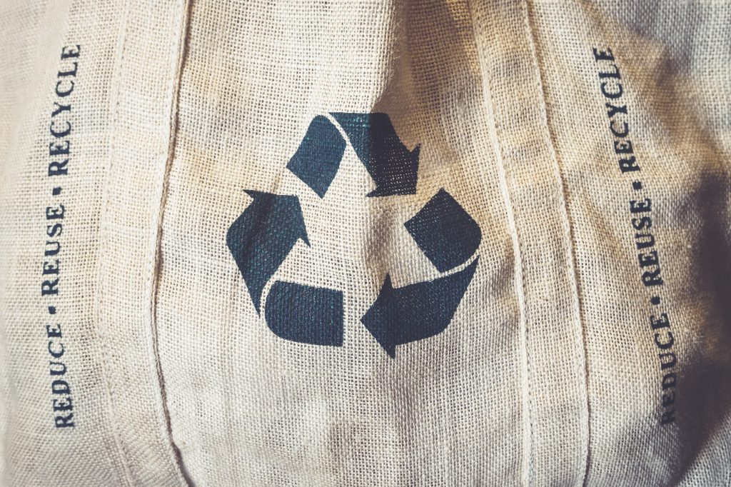 Recycle sign Symbol on Eco Shopping bag Environmental friendly