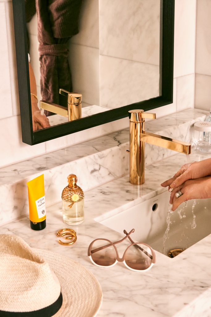 Gold tapware in bathroom